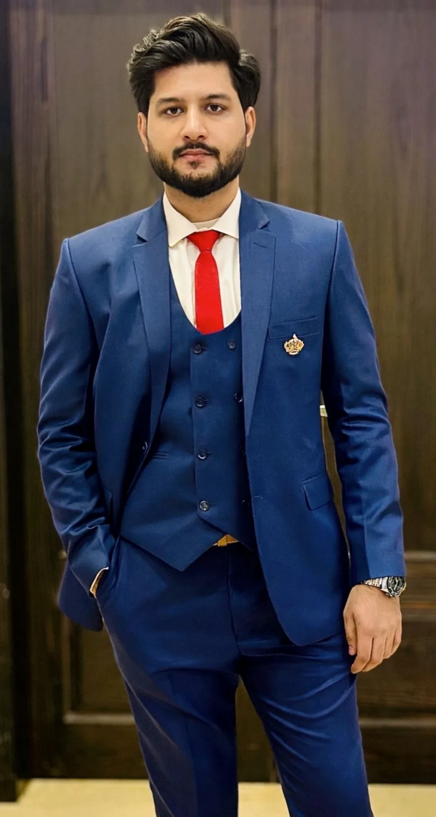 Sameed Abid, business operations and automation professional, in a navy three-piece suit